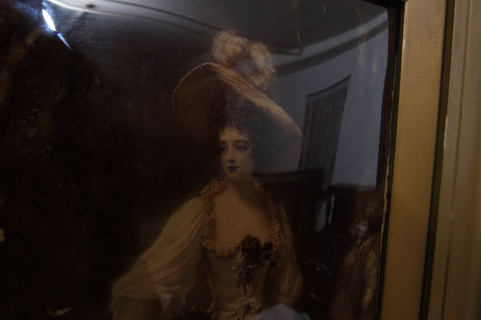 A Lady with a very large hat/crystolian painting