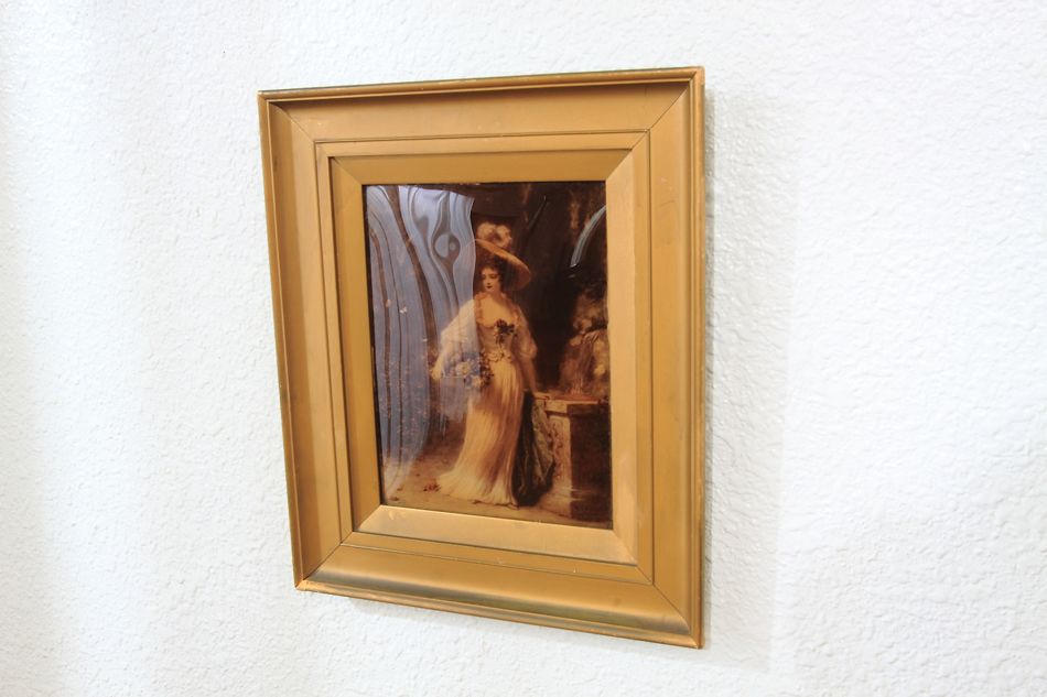 A Lady with a very large hat/crystolian painting