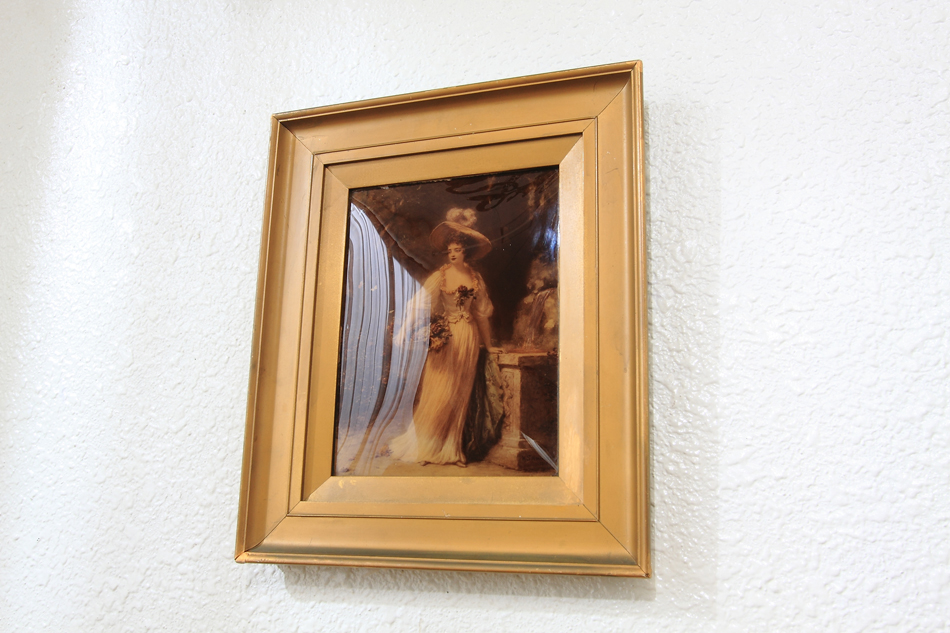 A Lady with a very large hat/crystolian painting