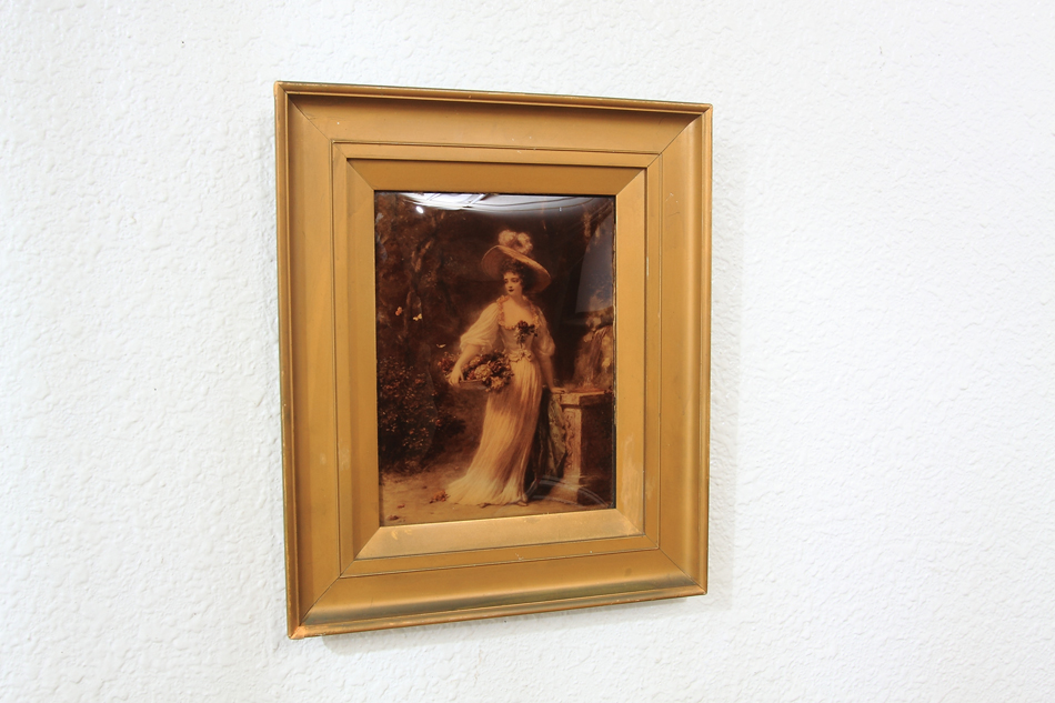 A Lady with a very large hat/crystolian painting
